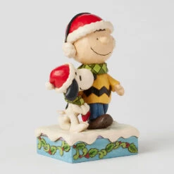 Enesco Jim Shore Peanuts Charlie Brown And Snoopy Wrapped In Scarf Figurine, 6" 10 Enesco Jim Shore Peanuts Charlie Brown And Snoopy Wrapped In Scarf Figurine, 6" -Hallmark Store Charlie Brown and Snoopy Sharing Scarf Figurine 6017237 03