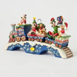 Enesco Jim Shore Mickey Mouse And Friends Light-Up Musical Train Figurine, 8.64" 13 Enesco Jim Shore Mickey Mouse And Friends Light-Up Musical Train Figurine, 8.64" -Hallmark Store Disney Characters LightUp Musical Train Figurine 6014996 05