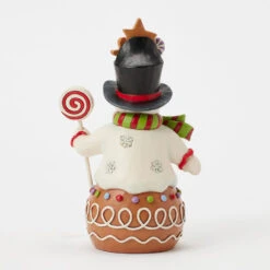 Enesco Jim Shore Heartwood Creek Gingerbread Snowman Figurine, 7" 7 Enesco Jim Shore Heartwood Creek Gingerbread Snowman Figurine, 7" -Hallmark Store Jim Shore Gingerbread Snowman Figurine 6017265 02