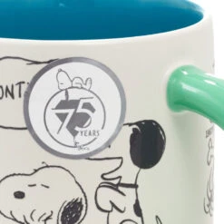Hallmark Peanuts® 75th Anniversary Snoopy Through The Decades Mug, 17.5 Oz. -Hallmark Store Peanuts Blue and Green 75th Anniversary Snoopy Mug 1PAJ4703 06