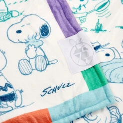 Hallmark Peanuts® 75th Anniversary Through The Years Plush Throw Blanket, 60x52 -Hallmark Store Peanuts Rainbow Comics 75th Anniversary Plush Blanket 1PAJ4704 03