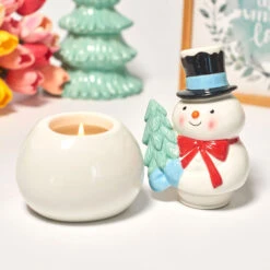 Peppermint Scented Ceramic Snowman Candle -Hallmark Store Peppermint Scented Ceramic Snowman Candle HMSNWMN 06