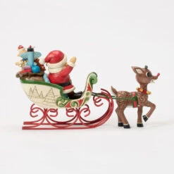 Enesco Jim Shore Rudolph Pulling Santa In Sleigh Figurine, 5" 8 Enesco Jim Shore Rudolph Pulling Santa In Sleigh Figurine, 5" -Hallmark Store Rudolph the RedNosed Reindeer and Santa Figurine 6017194 02